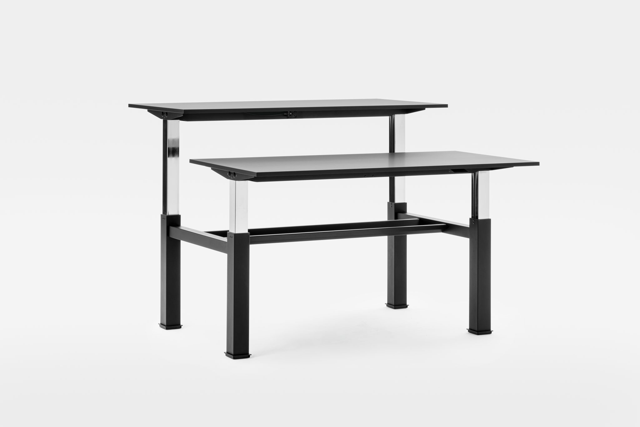 Follow hightadjustable bench desks • Thomson Furniture